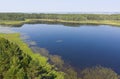 Aerial photo of forest boggy lake in the Karakansky pine forest near the shore of the Ob reservoir