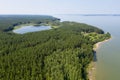 Aerial photo of forest boggy lake in the Karakansky pine forest near the shore of the Ob reservoir