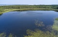 Aerial photo of forest boggy lake in the Karakansky pine forest near the shore of the Ob reservoir