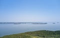 Aerial photo of forest boggy lake in the Karakansky pine forest near the shore of the Ob reservoir