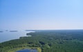 Aerial photo of forest boggy lake in the Karakansky pine forest near the shore of the Ob reservoir