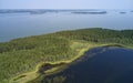 Aerial photo of forest boggy lake in the Karakansky pine forest near the shore of the Ob reservoir