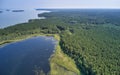 Aerial photo of forest boggy lake in the Karakansky pine forest near the shore of the Ob reservoir