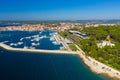 Aerial photo of hotels, beach and marina in Rovinj town