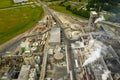 Aerial photo industrial power plant with smoke stacks blowing steam Royalty Free Stock Photo