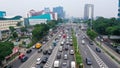 Aerial photo of Jakarta hectic traffic at peak hour with motorcycles and cars on the road