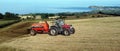 Aerial Photo of Massey Ferguson 390T Tractor Abbey Tanker spreading manure in a field on a farm in UK Royalty Free Stock Photo