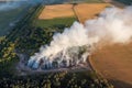 Drone photo of burning wastes at garbage site Royalty Free Stock Photo