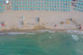 Aerial photo of Rimini coastline with many beach umbrellas in the beach