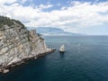 aerial photo of rock Parus Sail and Ayu-Dag Bear Mountain and near Gaspra, Yalta, Crimea at bright sunny day over Royalty Free Stock Photo