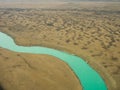 Aerial photo of sinuous, winding river with exotic colors