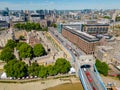 Aerial photo Tower of London and double decker busses with tourists