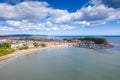 Aerial photo of the town centre of Scarborough in East Yorkshire in the UK showing the coastal beach and harbour with boats and Royalty Free Stock Photo