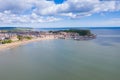 Aerial photo of the town centre of Scarborough in East Yorkshire in the UK showing the coastal beach and harbour with boats and Royalty Free Stock Photo