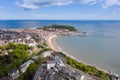 Aerial photo of the town centre of Scarborough in East Yorkshire in the UK showing the coastal beach and harbour with boats and Royalty Free Stock Photo