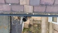 Aerial photo of a typical British terrace house showing tiles on the roof and dirty gutters that need to be cleaning Royalty Free Stock Photo