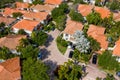 Aerial photo upscale Miami neighborhood with palm trees and cars in driveway Royalty Free Stock Photo