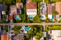 Aerial photo of upscale residential houses with swimming pools Hollywood Lakes FL USA