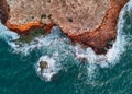 Rocky mountain coastline and Mediterranean Sea waters surf