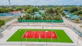 Aerial photo of volleyball court at the Maamigili secluded tropical island at the Alif Dhaal Atoll at the indian ocean Royalty Free Stock Photo