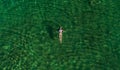 Aerial photograph of a girl swimming in one of the lagoons of CuatrociÃÂ©negas, Coahuila, Mexico. Royalty Free Stock Photo