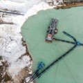 Aerial photograph of a large suction dredger in a wet mining process for quartzite snow-white sand Royalty Free Stock Photo