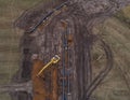 Aerial photograph of the laying pipe of large diameter in clay soil. Autumn