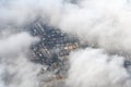 Aerial photography of the suburbs near Washington DC as seen though clouds