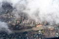 Aerial photography of the suburbs near Washington DC as seen though clouds