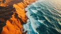 Aerial Photography, aerial view of the Namib Desert meeting the Atlantic Ocean, dramatic interplay of land and sea Royalty Free Stock Photo