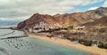 Aerial photography drone point of view of Playa de Las Teresitas beach picturesque distant view of mountainous terrain bright Royalty Free Stock Photo