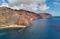 Aerial drone point of view of Playa de Las Teresitas beach picturesque distant view of mountainous terrain bright Royalty Free Stock Photo