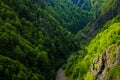 Aerial photography high in the mountains. Mountain road view, selective focus Royalty Free Stock Photo