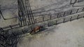 Aerial photography of a horse farm. A horse in a pen behind a fence