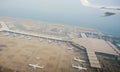 Aerial photography of the international airport with airplanes parking. Hong Kong International Airport. Royalty Free Stock Photo