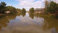 Aerial photography of the river flowing along the forest