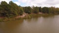 Aerial photography of the river flowing along the forest