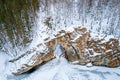 Aerial photography on rocks in the form of a gate in the forest near the river in winter Royalty Free Stock Photo