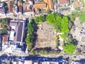 A FIELD IN THE MIDDLE OF URBAN AREA - STOCK PHOTO