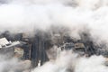 Aerial photography of the suburbs near Washington DC as seen though clouds