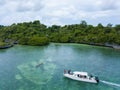 Aerial photography view of Wakatobi islands with a white boat, Southeast Sulawesi, Indon Royalty Free Stock Photo