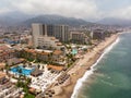 Aerial photos of the pier knows as Playa Los Muertos pier in the beautiful town of Puerto Vallarta in Mexico, the town is on the