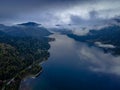 The aerial picture of cloudy and foggy Lake Teletskoye in Altai mountains forests in Russia Royalty Free Stock Photo