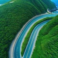 aerial picture of a curvy road next to the ocean in Namhae