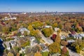 Aerial picture of houses in Midtown Atlanta during the fall with Buckhead buildings in the background