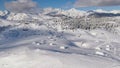 AERIAL: Picturesque drone view of the idyllic winter landscape of Velika Planina