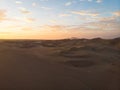 Aerial postcard panorama sunset view of isolated vast dry sand dunes desert of Huacachina Ica Peru South America Royalty Free Stock Photo