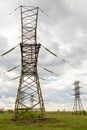 Aerial power lines in a field