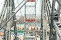 aerial red cabin view and steel frame construction of oldest ferris wheel in Vienna Prater amusemaent fair park during cold snowy Royalty Free Stock Photo