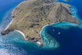 Aerial of Reef and Rugged Island in Komodo National Park